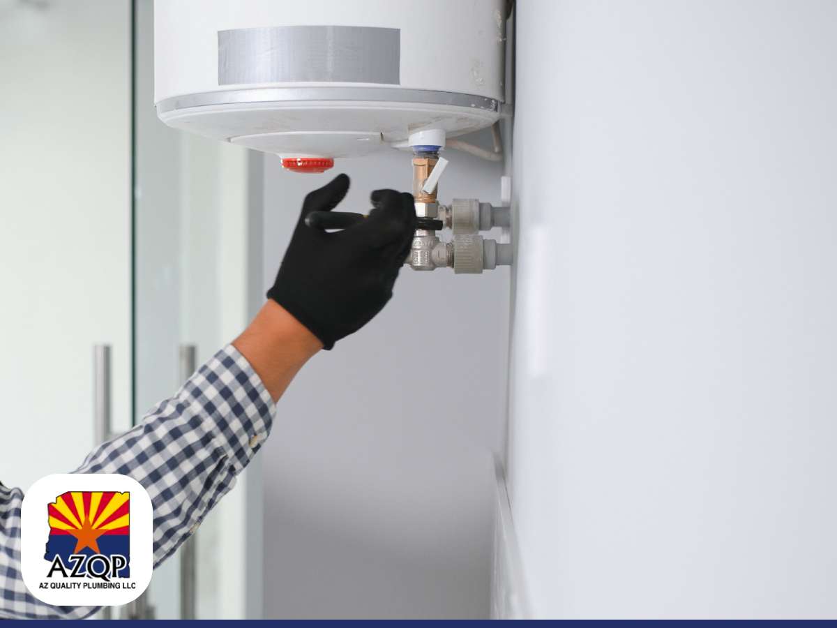 A plumber working on installing a water heater, showcasing the importance of professional care for your home's water heating system